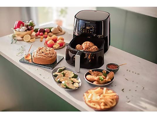 De Ninja Airfryer MAX PRO bakt frietjes met hete lucht en slechts een klein beetje olie, waardoor ze goudbruin en krokant worden zonder overtollig vet.